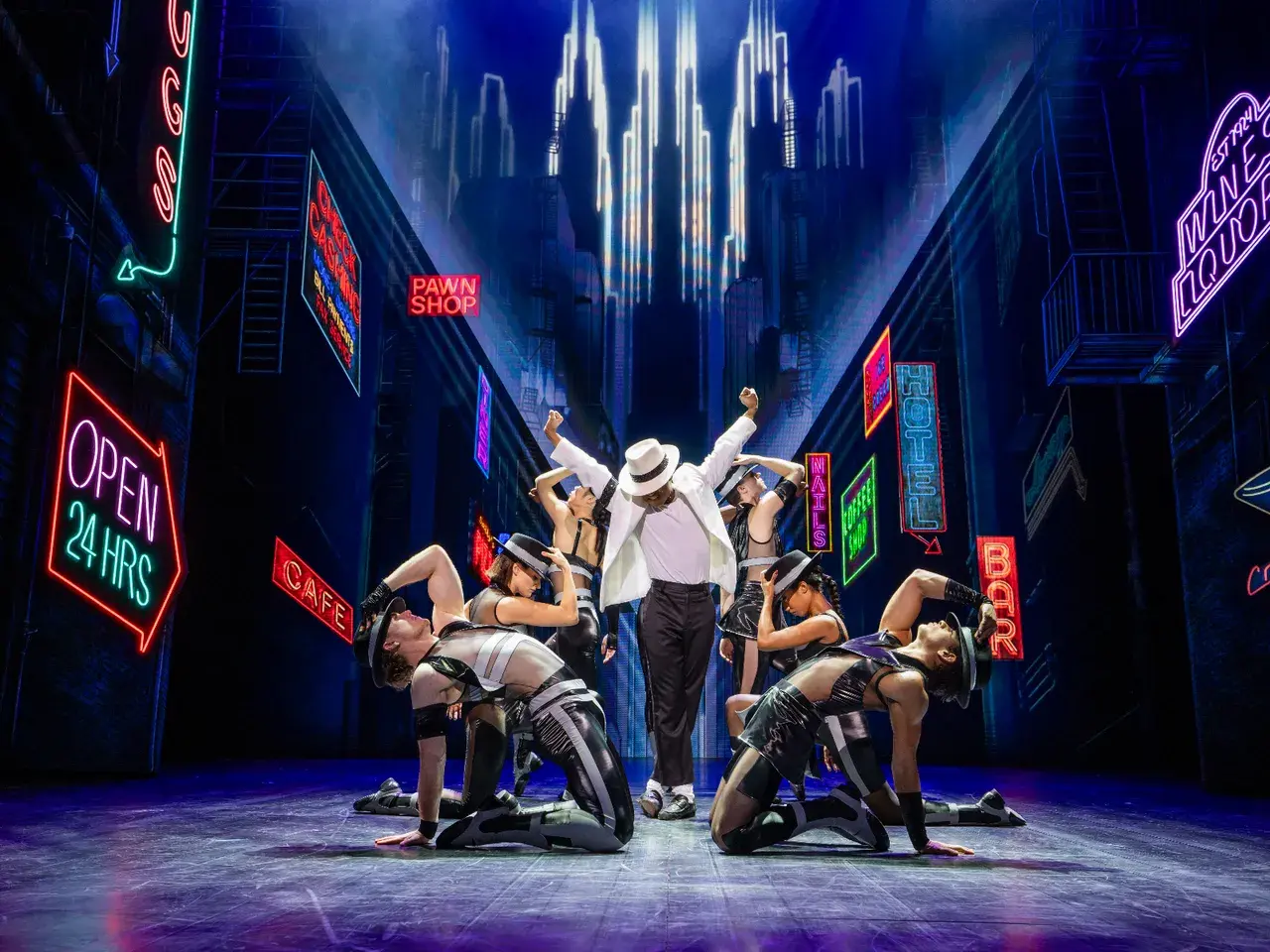 MJ The Musical on stage - TSA custom lift, turntable, rigging and printed soft goods kept show-ready on tour