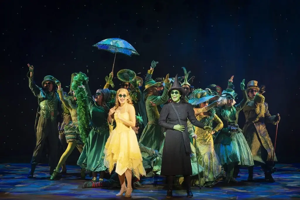 Glinda, Elphaba and the company of Wicked in the Emerald City. Photo: Jeff Busby.
